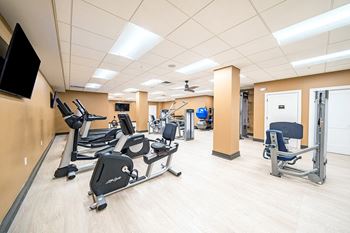 Fitness Center with Cardio Equipment, Fixed Weight Machines, Free Weights, Exercise Balls and Stretching Mats